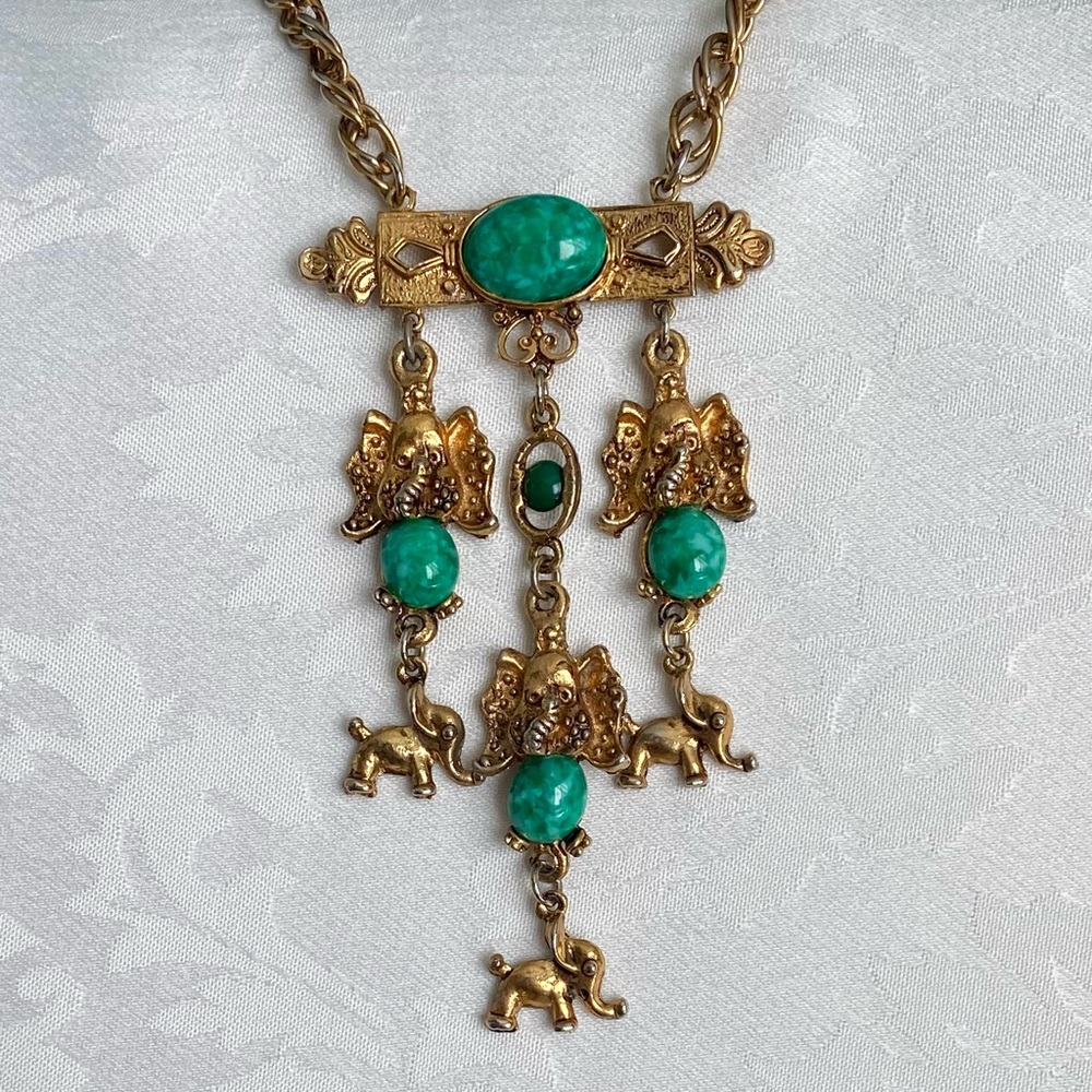 Unique vintage necklace with jade colored stones and elephants